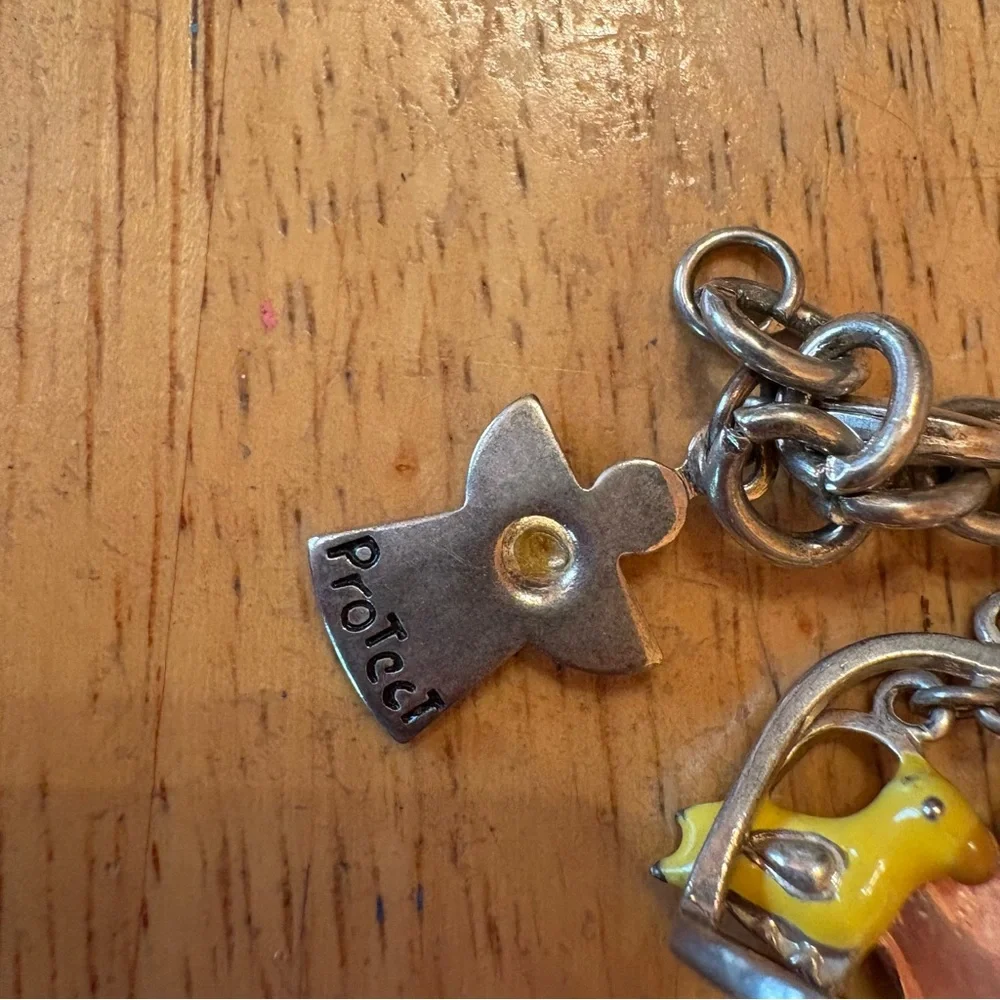 Claires silver charm